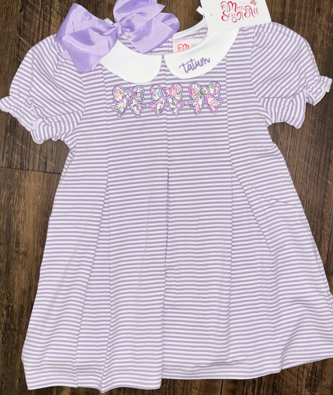 Purple bow dress